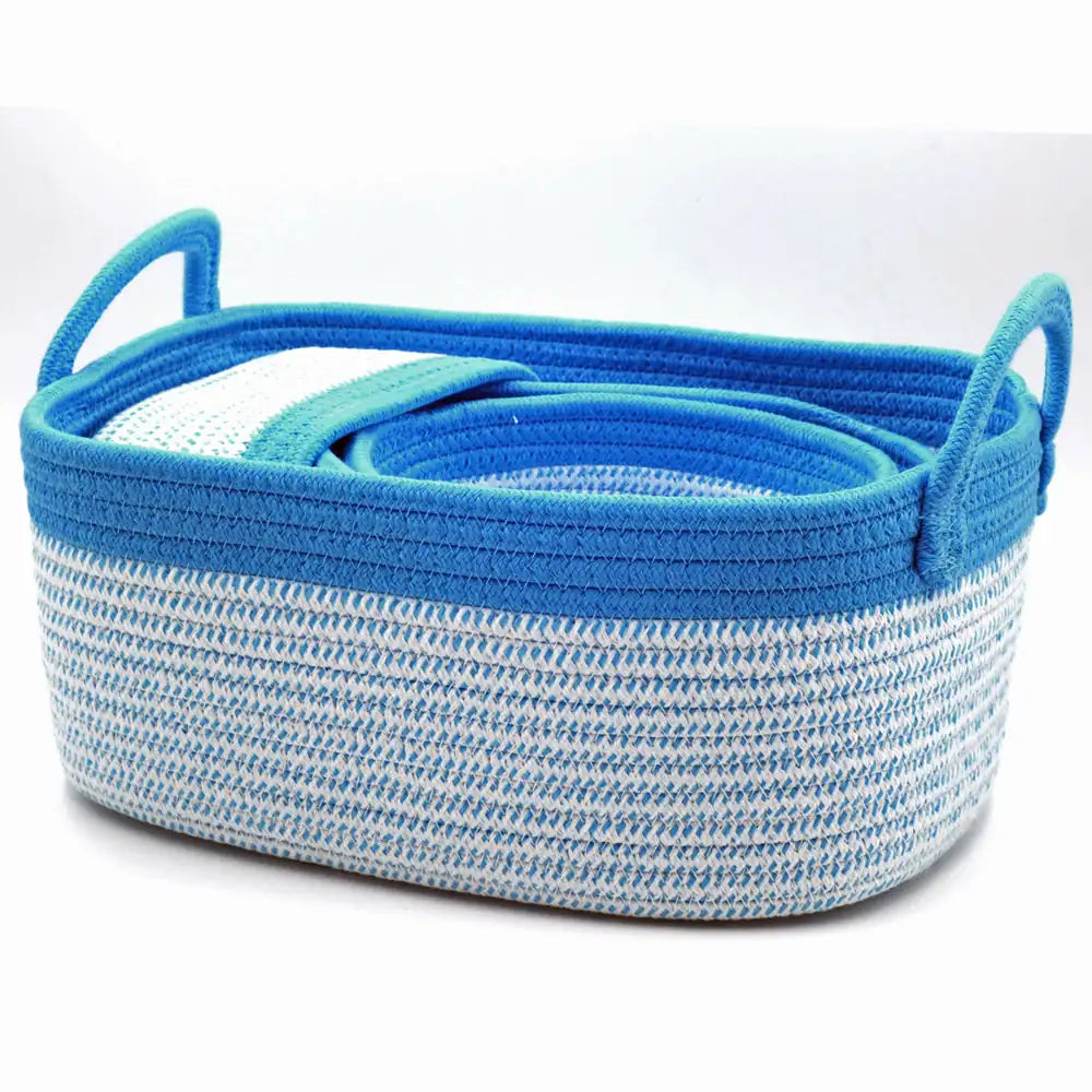 Woven storage basket with blue and white striped pattern on a white background