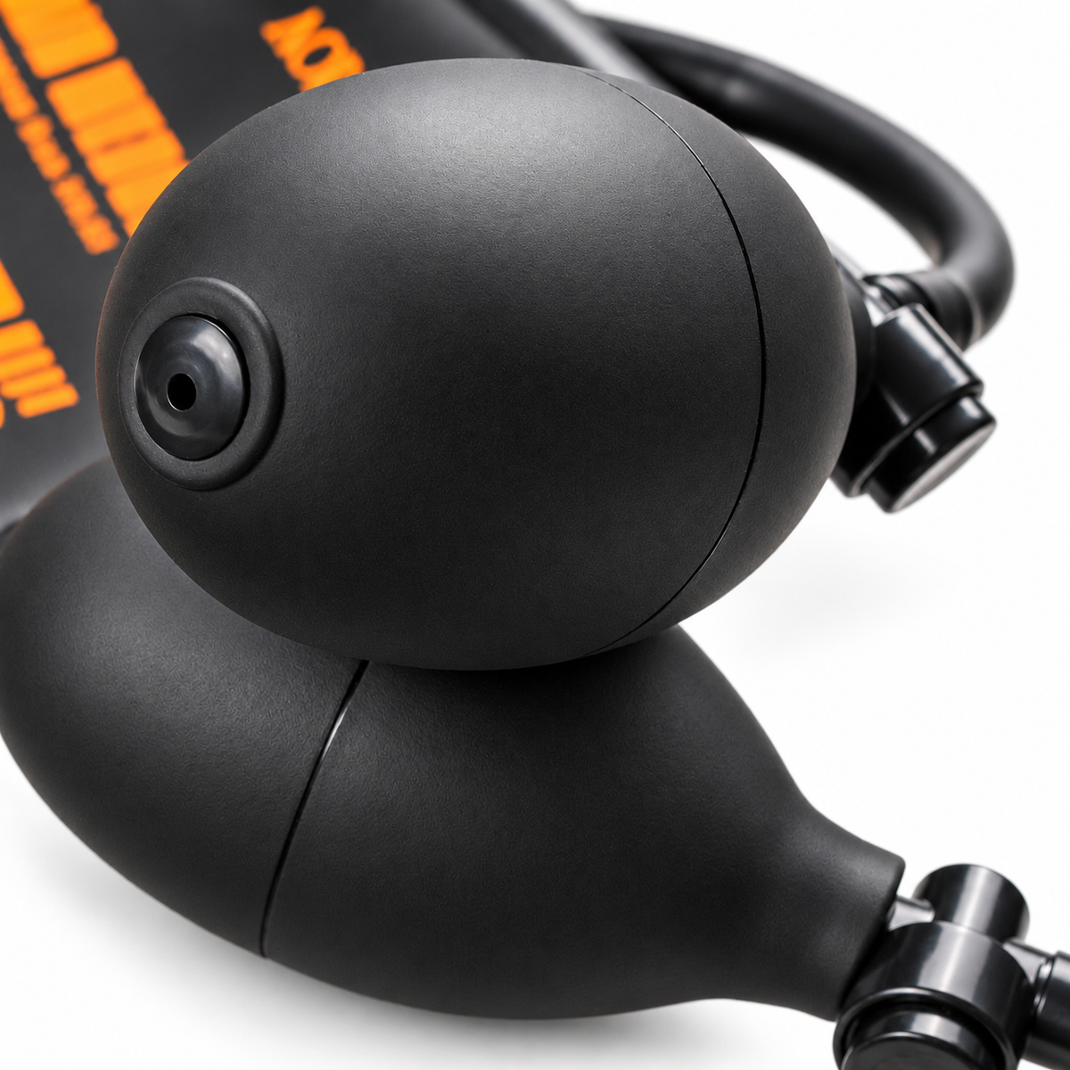 Close-up of the Acroma air wedge black rubber squeeze pump, hose and air valve.