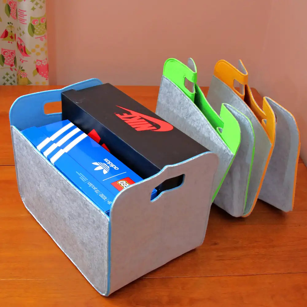 Foldable felt storage bins by HomeDude shown beside stuffed animals – lightweight and space-saving storage for home or stable use.